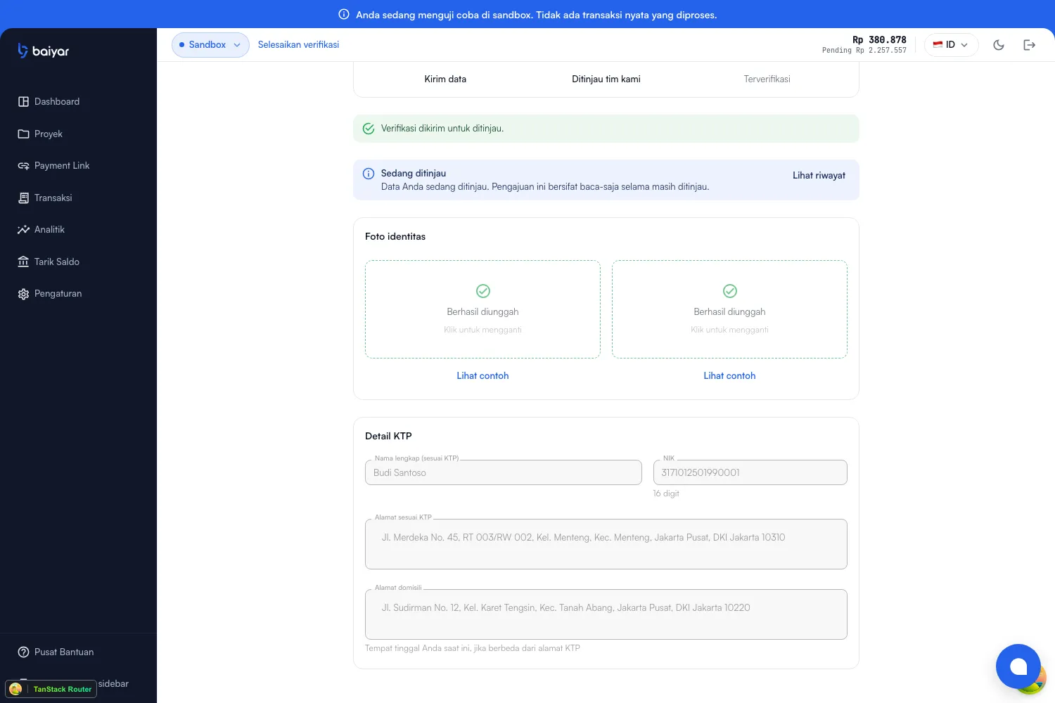 The Verification page after submitting: status Under review, a read-only form with both photos still showing as uploaded, and no Save draft or Submit buttons
